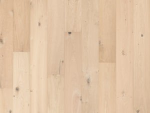 Parquet contrecollé en chêne Savannah de Solidfloor, finition huilée blanc invisible, avec des veines naturelles et des nœuds distinctifs.