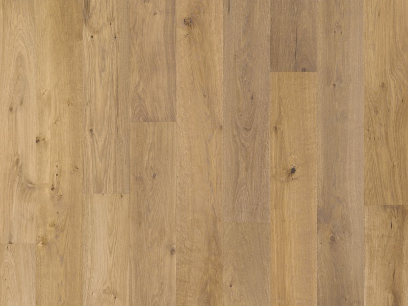 Le parquet contrecollé en chêne Savannah de Solidfloor, dans sa finition fumée et huilée, présente une teinte chaude et naturelle.